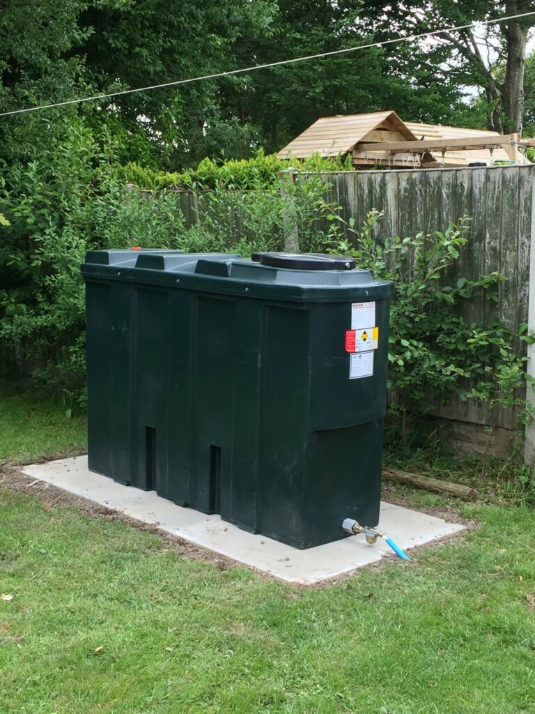 new oil tank installation Close up Heating Economy